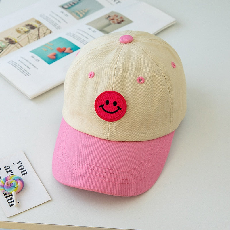 Casquette smiley enfant rose
