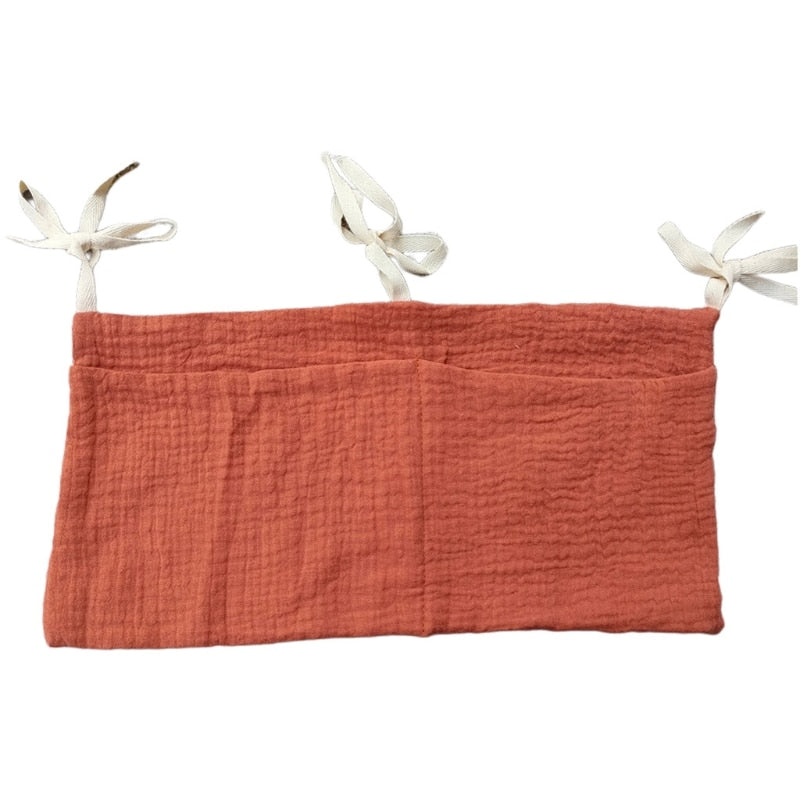 Vide-poche lit bébé en gaze de coton rouille