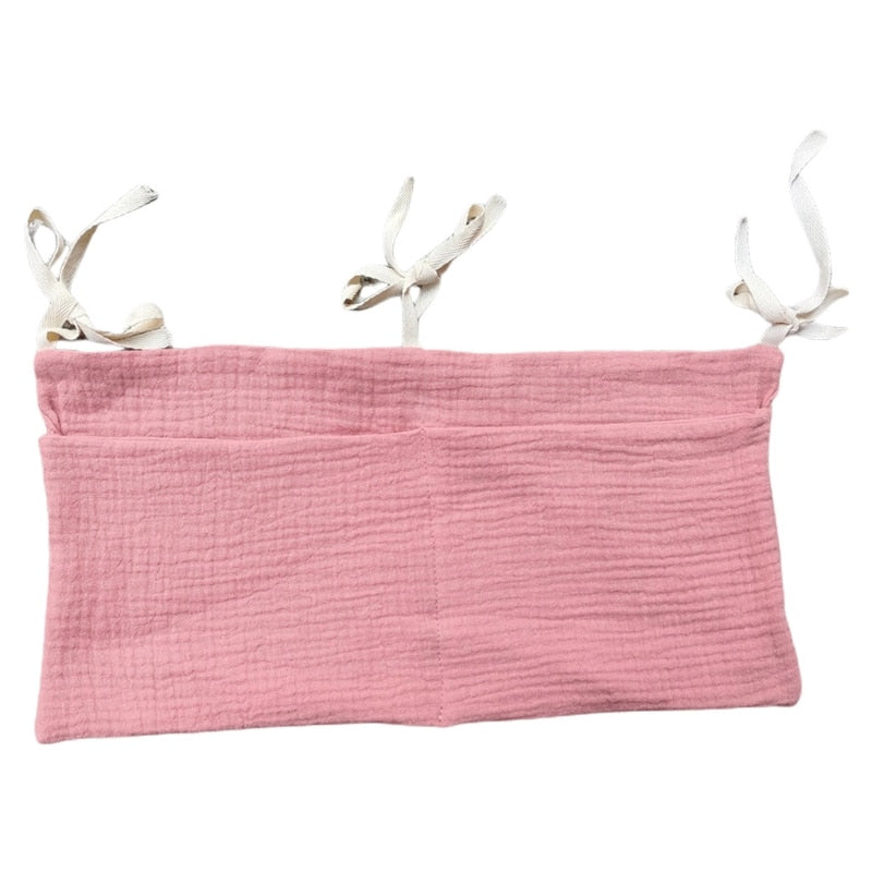 Vide-poche lit bébé en gaze de coton rose