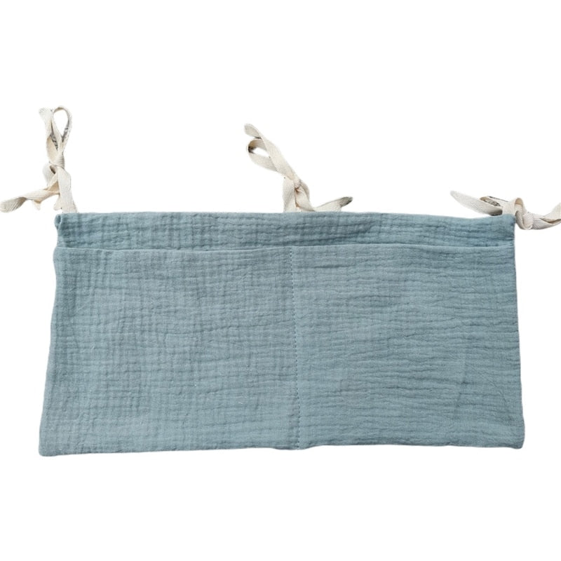 Vide-poche lit bébé en gaze de coton bleu