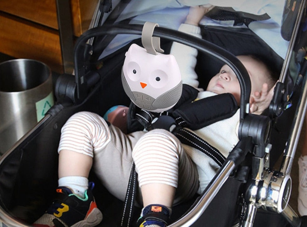 Boîte musicale pour bébé qui s'accroche à la poussette