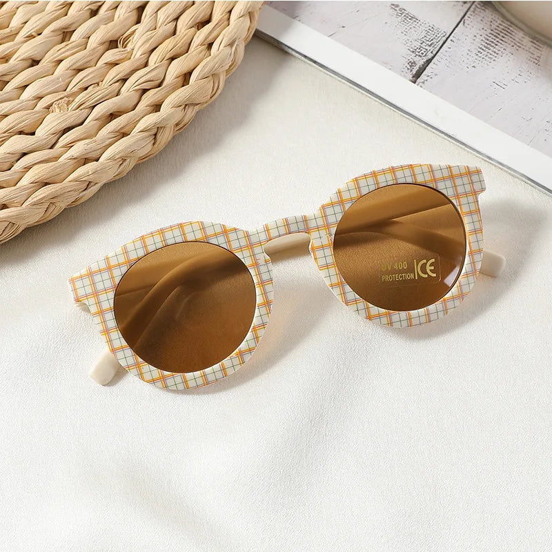 Lunettes de soleil bébé ronde à damier
