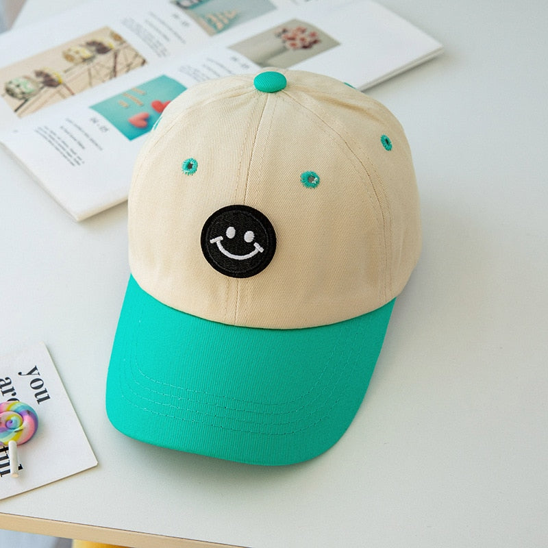 Casquette smiley enfant turquoise