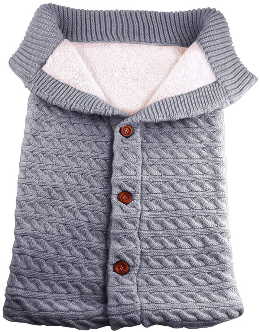 Zoom sur nid d'ange effet tricot gris avec boutons gris